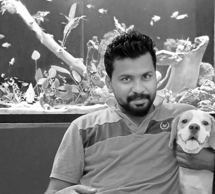 Binoy with his dog Mango